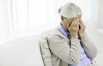 distraught elderly woman